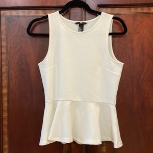 H & M cream colored peplum top. Size small